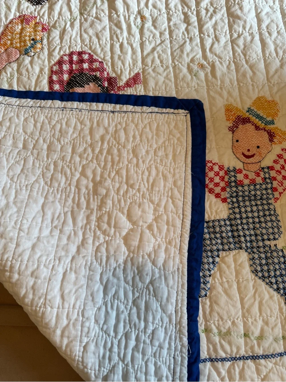 Vintage embroidered kids quilt